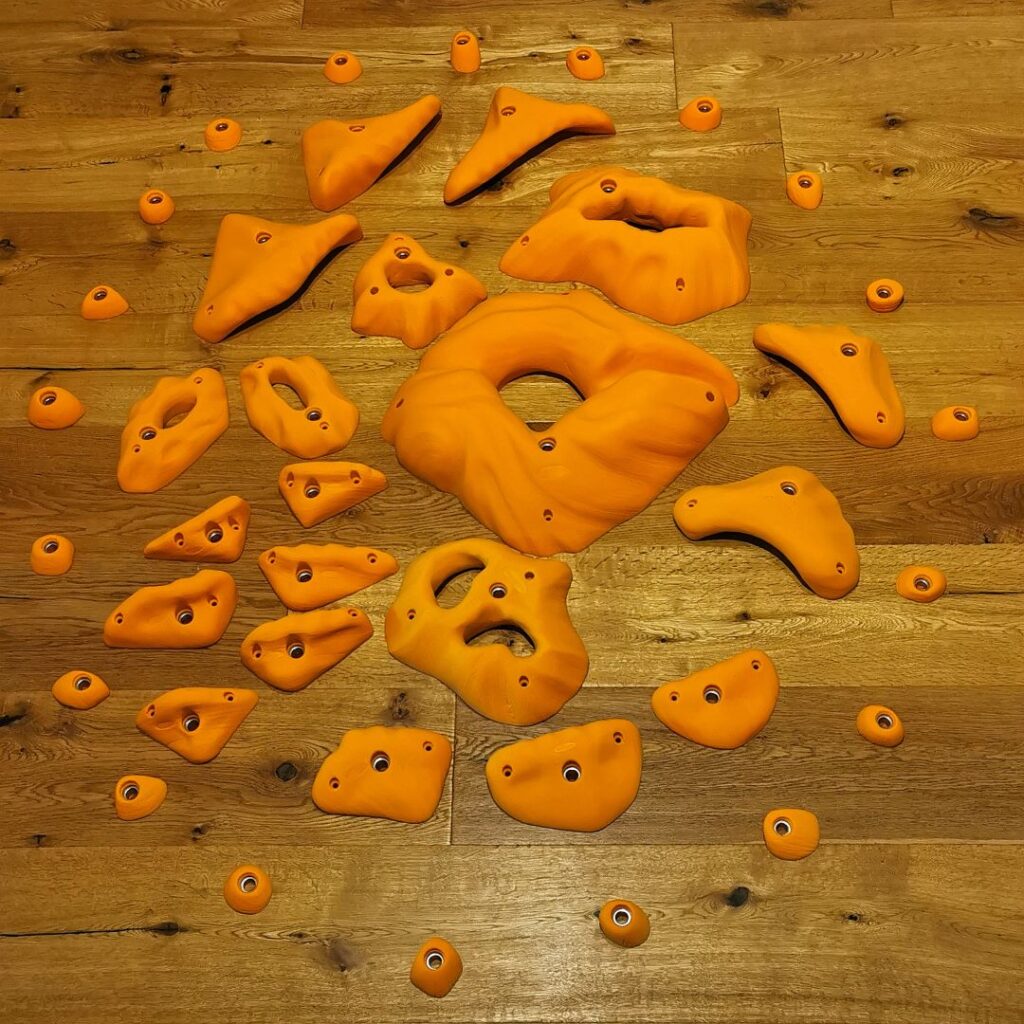 Fantasy Select climbing holds in orange
