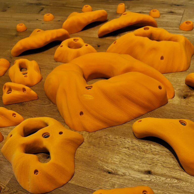 Fantasy Select climbing holds in orange