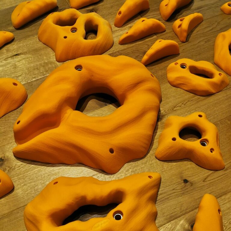 Fantasy Select climbing holds in orange